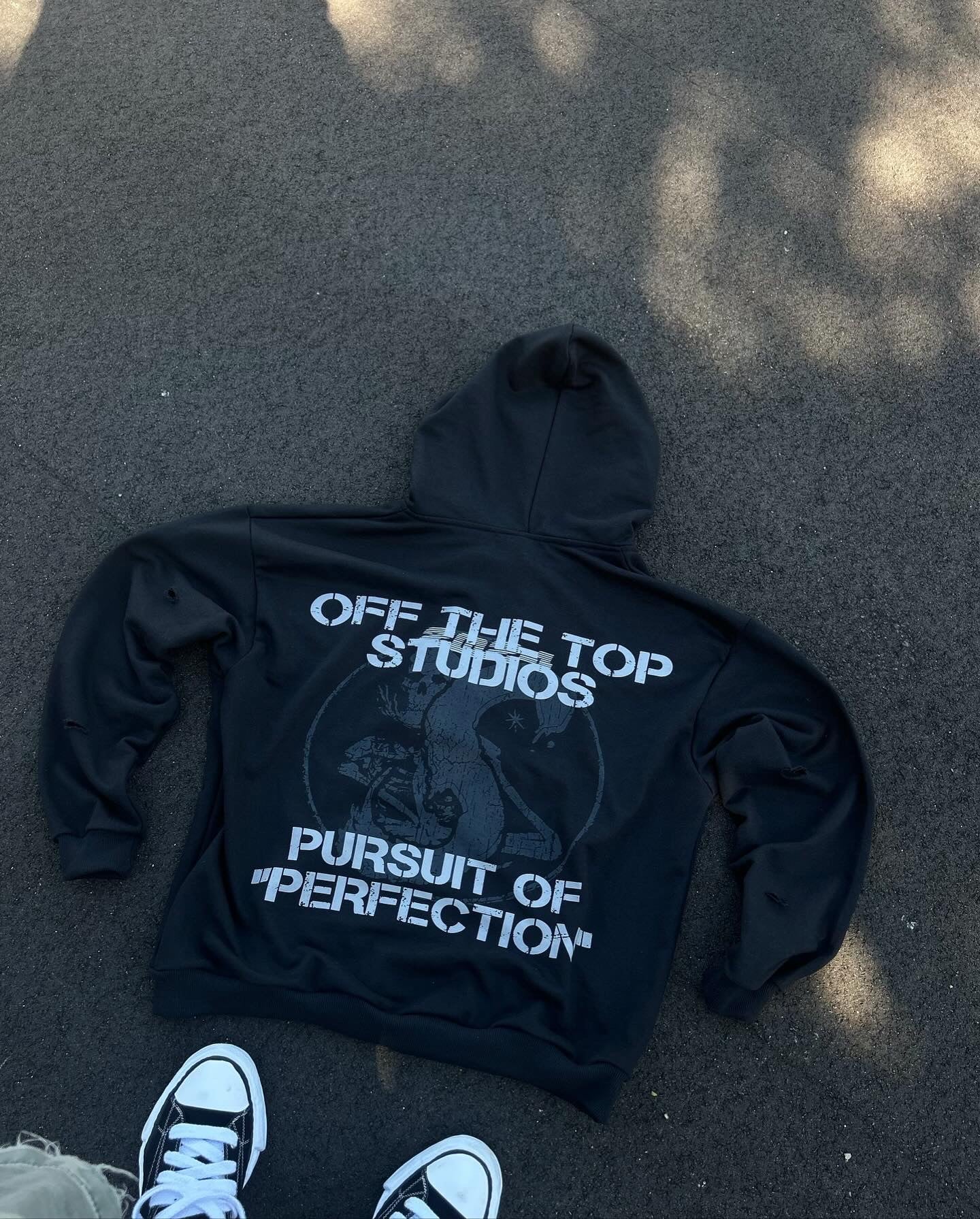 "PURSUIT TO PERFECTION" ZIP UP